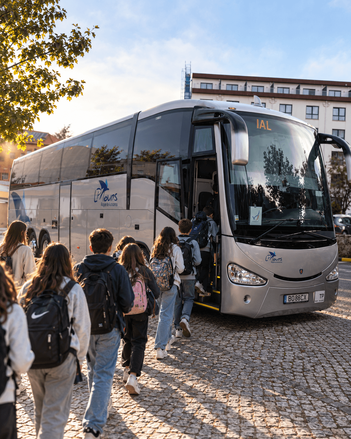 Students boarding an LP Tours coach as part of the school transport service.
